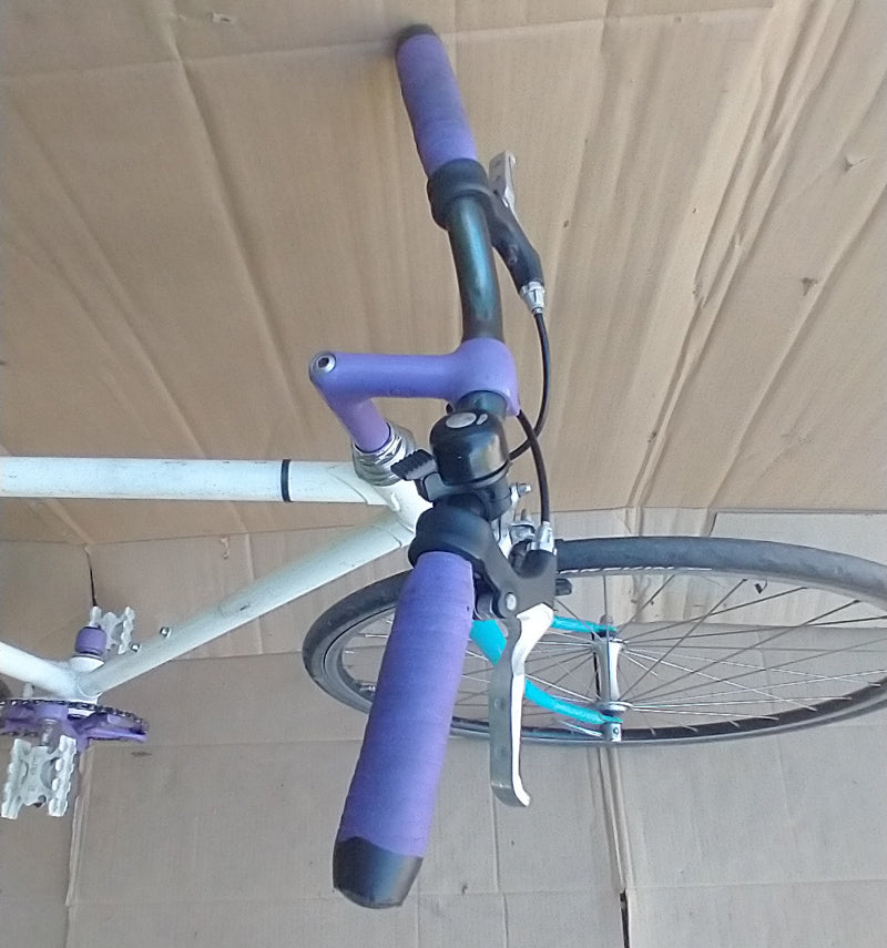 Flix Flop Fixie with purple and white accents. 52cm. used. consignment, no tax, no warranty