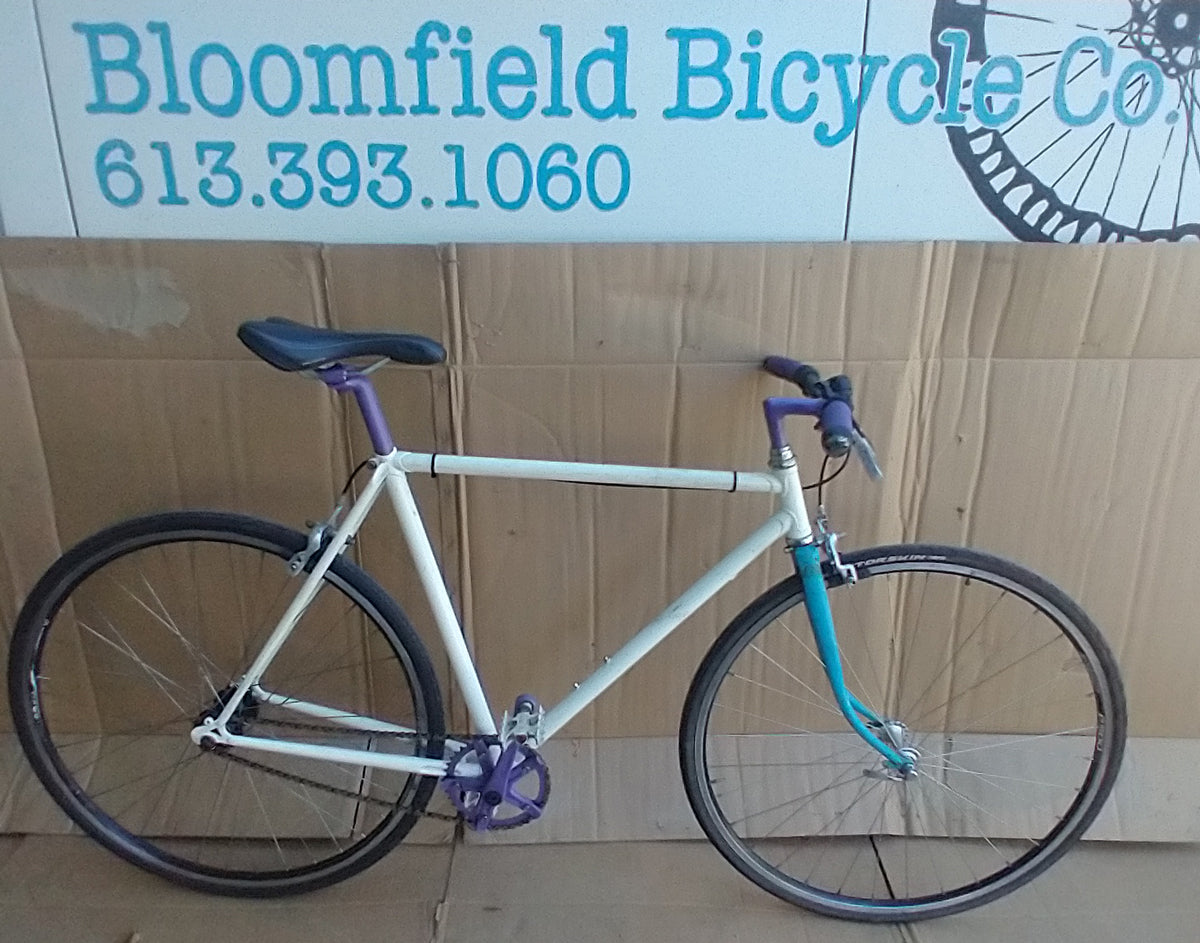 Flix Flop Fixie with purple and white accents. 52cm. used. consignment, no tax, no warranty
